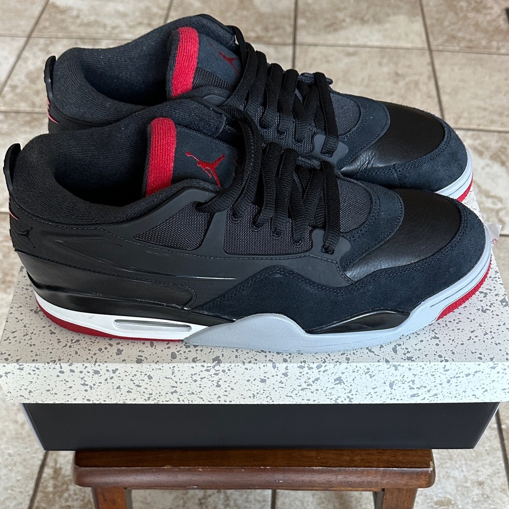 Jordan Air 4 RM Black and Red Sneakers